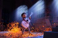 Child plays guitar