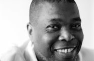 Black and white photo portrait of Hilton Als by Brigitte Lacombe