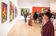 People view Bob Thompson's paintings in the Hammer gallery