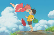 Still from Ponyo, showing two animated characters, one floating in the air. Credit: Photofest/Walt Disney Pictures
