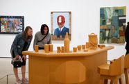 Two women look at an art installation