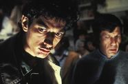 Jeff Goldblum and Lenard Nimoy, seen in medium close-up