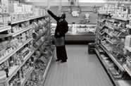A man shops in a supermarket
