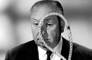 Alfred Hitchcock peering through a noose