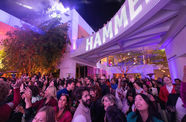 A large crowd in the Hammer Museum courtyard