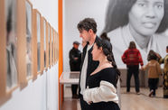 Museumgoers looking at art