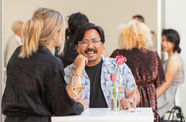 Visitors enjoying drinks at the 2022 summer exhibitions opening