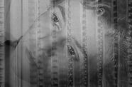 Close up of a woman's face, with film strips superimposed over it