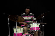 Machado Mijiga plays the drums