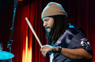 Malachi Whitson plays the drums 