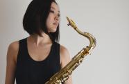 Hitomi Oba photograph, with brass instrument