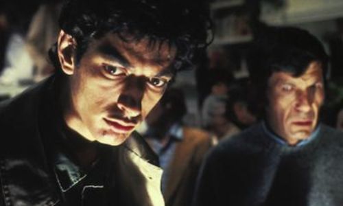 Jeff Goldblum and Lenard Nimoy, seen in medium close-up