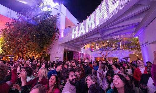 A large crowd in the Hammer Museum courtyard
