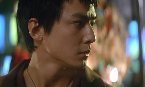 The actor Daniel Wu seen in profile