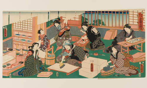 Woodblock of women making woodcut prints in a studio
