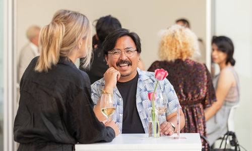 Visitors enjoying drinks at the 2022 summer exhibitions opening