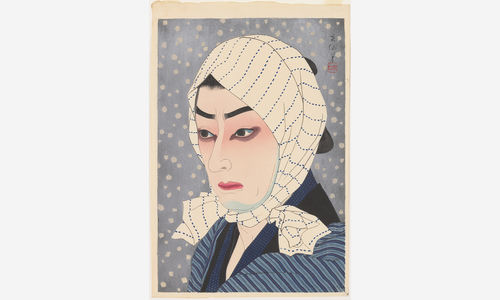 A Japanese woodblock print depicting the bust of a person in 3/4 view, looking to the viewer's left. The person has white skin, red lips, and dark shadows under the eyes, and wears a blue striped piece of fabric over the head and tied under the chin. The figure is wearing a blue striped shirt with black color, and the background is ligh tblue with small white circles as if to depict snow. At upper right is Japanese caligraphy and a red real. 