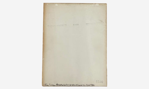 A bare paper with Aram Saroyan's name stamped across it