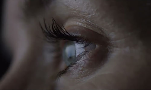 A woman's eye seen in extreme closeup