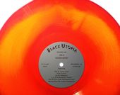 Bright orange record with Black Utopia as title