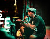 man sings to the front row of a concert