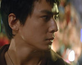 The actor Daniel Wu seen in profile