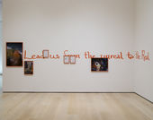 Artwork consisting of a number of framed photographs and watt text reading "Lead us from the unreal to the Real"