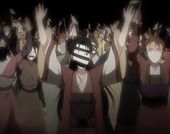 A crowd of anime characters wearing robes and various masks stand with their arms up and their eyebrows furrowed. 